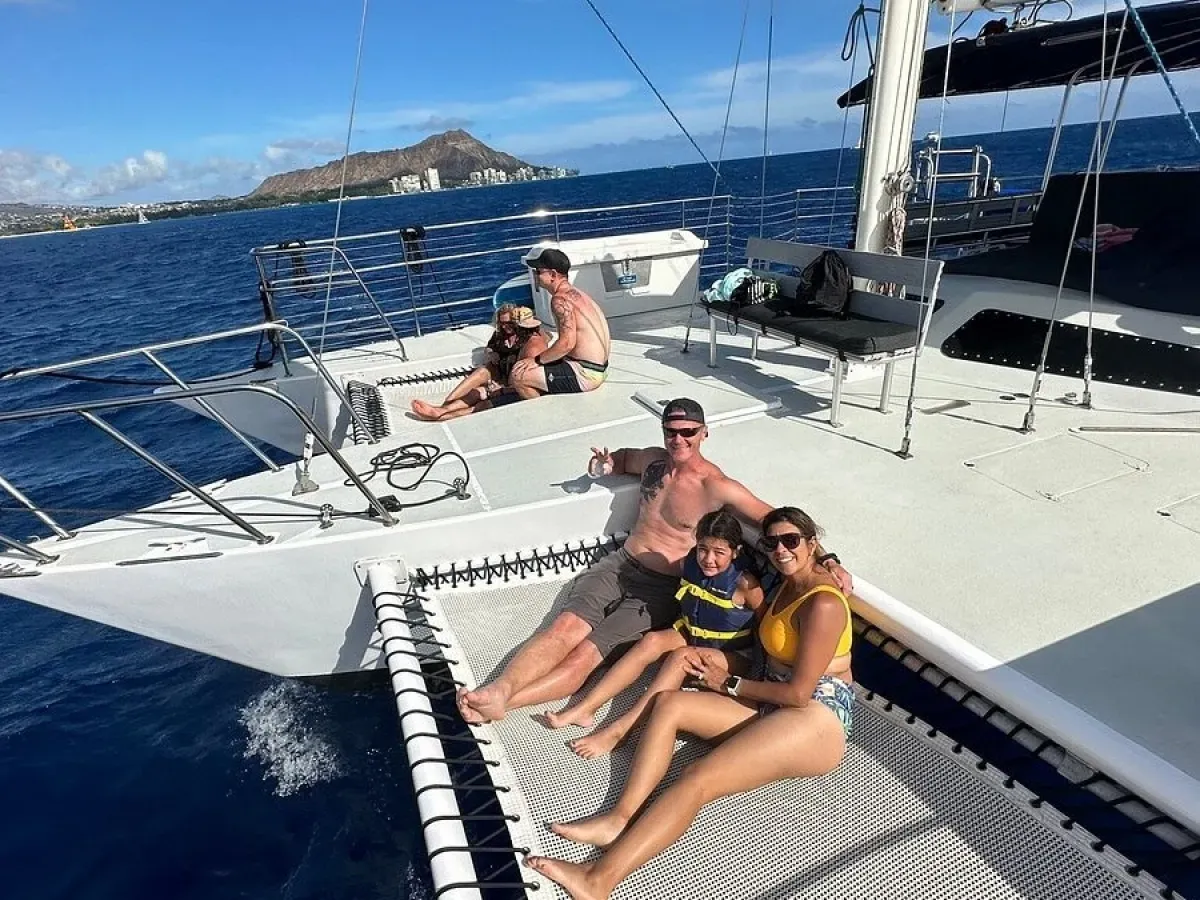 A private charter boat next to calm Hawaii waters